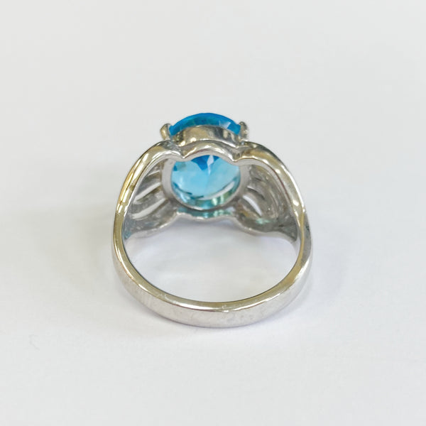 14k Oval Blue Topaz Ring
