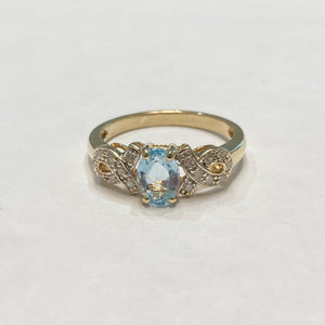 10k Oval Blue Topaz & Melee Diamond Ring