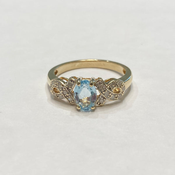 10k Oval Blue Topaz & Melee Diamond Ring