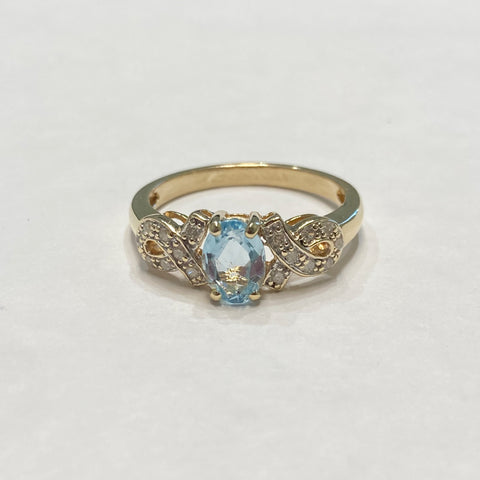 10k Oval Blue Topaz & Melee Diamond Ring