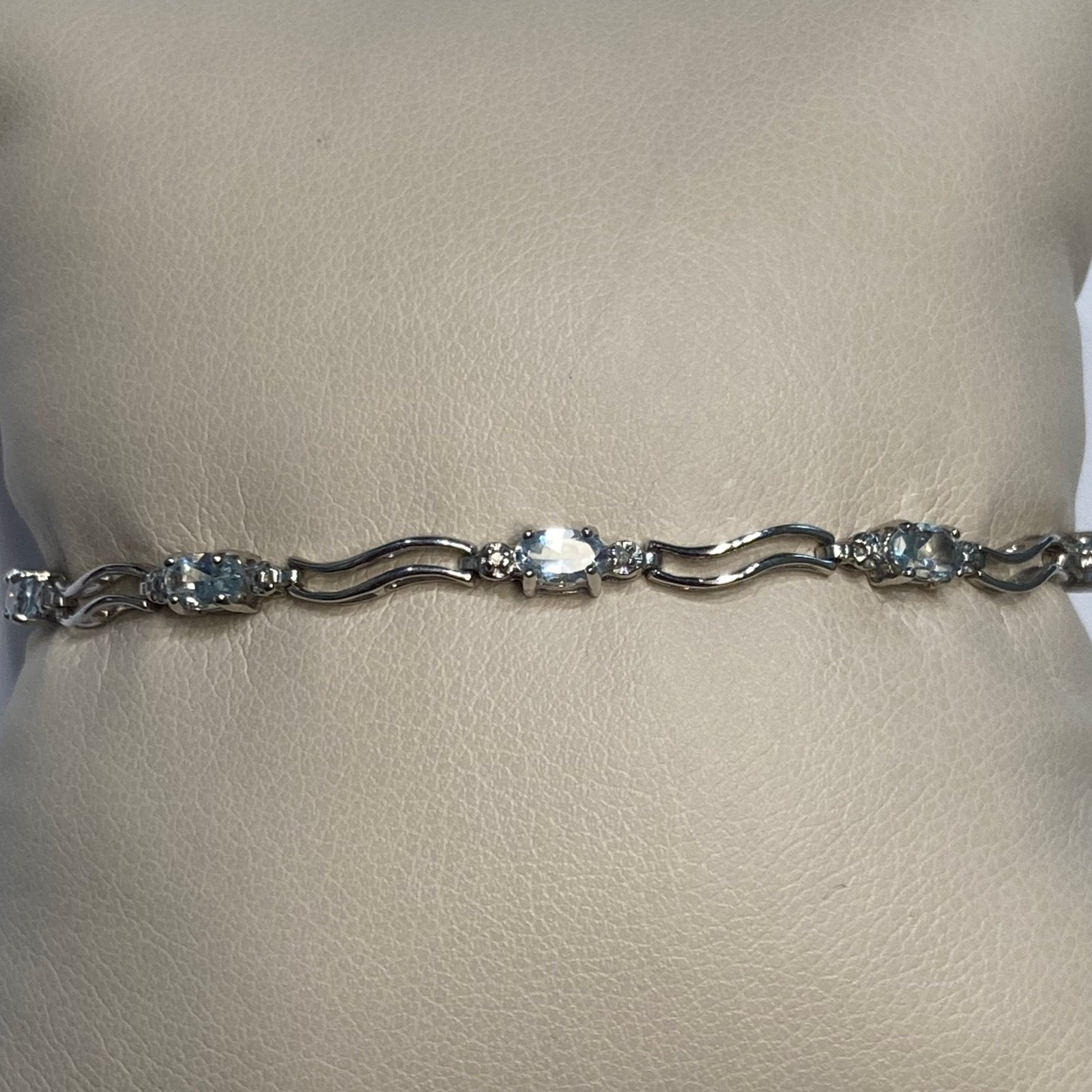 7.25" 10KWG Sky Blue Topaz & Melee Diamond Bracelet