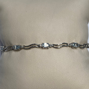 7.25" 10KWG Sky Blue Topaz & Melee Diamond Bracelet