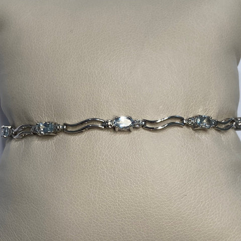 7.25" 10KWG Sky Blue Topaz & Melee Diamond Bracelet