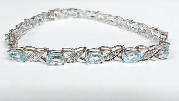 7.5" Sterling Blue Topaz "XOXO" Bracelet