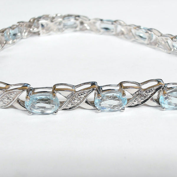 7.5" Sterling Blue Topaz "XOXO" Bracelet