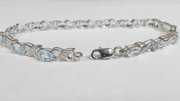 7.5" Sterling Blue Topaz "XOXO" Bracelet