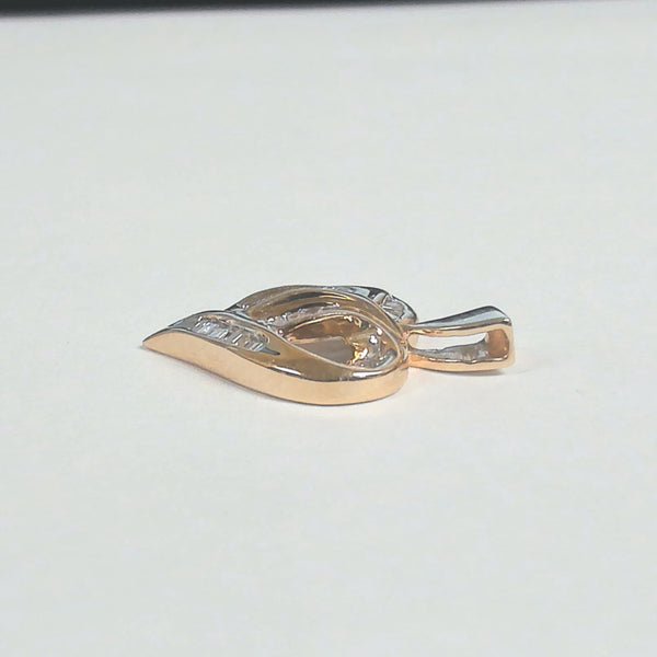 10k Baguette/Round Diamond Heart Pendant